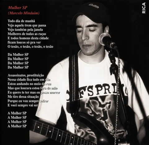 Eu Não Tô Nem Aí booklet page with lyrics.