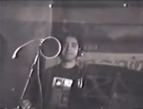 Estúdio Anonimato · 1994 — original video frame capture 5, preserved in low quality.